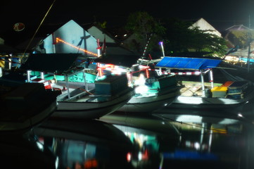 traditional fishing boat that still uses traditional fishing equipment, this boat is made of wood...