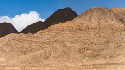 Fototapeta na wymiar barren mountains on rocky desert landscape