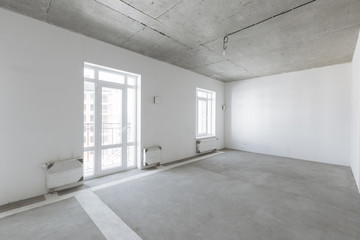 interior of the apartment without decoration in bright colors