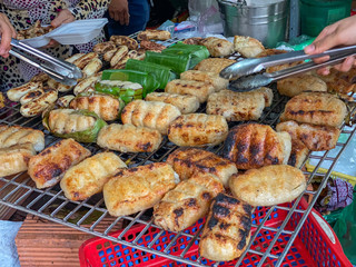 Grilled banana wrapped with sticky rice at Cambodia outdoor market