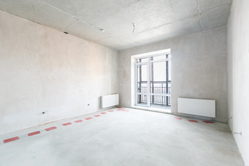 interior of the apartment without decoration in bright colors