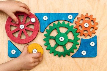 hands with gear