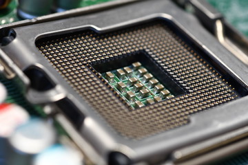 Close-Up of CPU Socket on a Modern Computer Motherboard. Electronic Small Component Details.