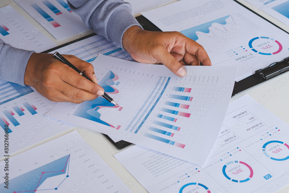 Poster businessman working calculate data document graph chart report marketing research development planni