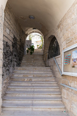 Narrow street with steps leading up in Bethlehem in Palestine