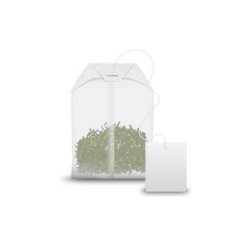Green tea in teabag with blank label isolated. Vector Chinese drink in pack, mockup template