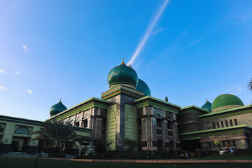 Grand Islamic Mosque With Blue Sky as Background