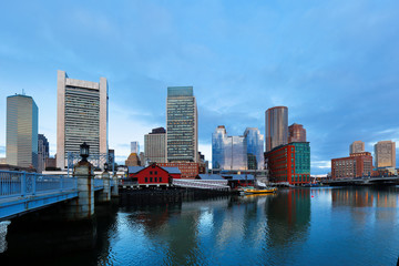 Fototapeta premium Boston Harbor at sunrise viewing from Fan Pier Park. Boston Harbor is a natural harbor and estuary of Massachusetts Bay,