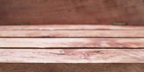 Wood table with blurry wooden background