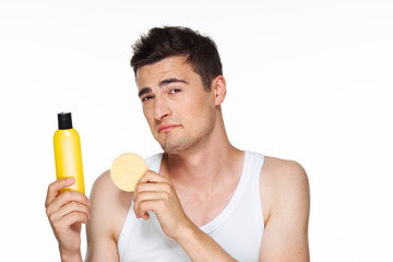 Fototapeta premium young man drinking orange juice