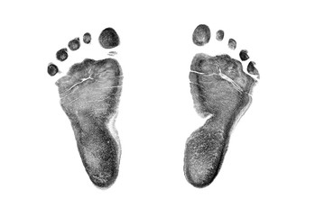 Baby footprints on transparent paper. Black footprint isolated on white background.  - 312779214