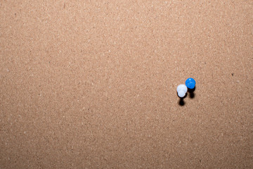 Corkboard background with pins
