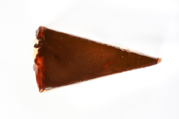 Chocolate crepe layer cake slice white background