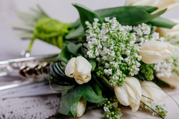Bouquet of white tulips with lilac