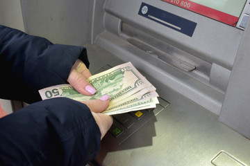 Get cash in ATM.