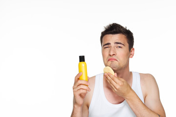 man drinking orange juice isolated on white