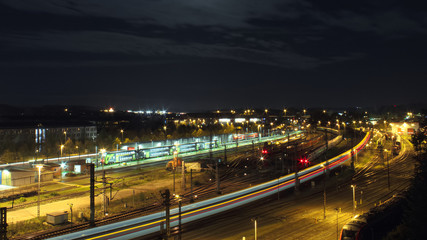 Naklejka na ściany i meble Long exposure of a train station at night
