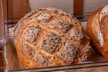 Black round bread with tmina grains