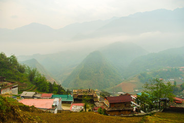 Sunrise and morning fog over Sapa town, Vietnam 