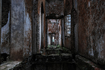 Fototapeta na wymiar Burned and abandoned old French church in Vietnam, urbex 
