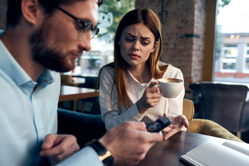 young couple in cafe