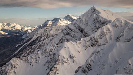 Snow-capped peaks of the North Caucasus mountains. Krasnaya Polyana Sochi. High in the mountains....