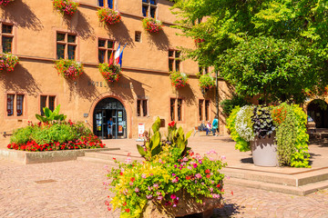 Fototapeta na wymiar ALSACE WINE REGION, FRANCE - SEP 19, 2019: Square in Kaysersberg picturesque village which is located on Alsatian Wine Route, France.