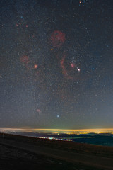 Winter night sky including Barnard’s Loop, the Orion Nebula, the Flame Nebula, the Rosette...