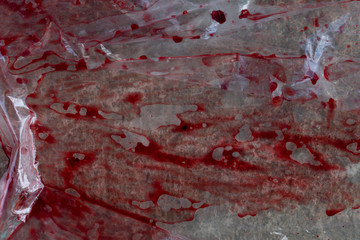 Blood stains in plastic bags.