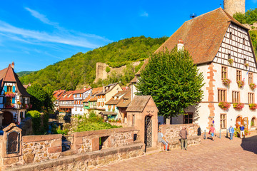 ALSACE WINE REGION, FRANCE - SEP 20, 2019: Colorful houses decorated with flowers in Kaysersberg village which is located on Alsatian Wine Route, France.