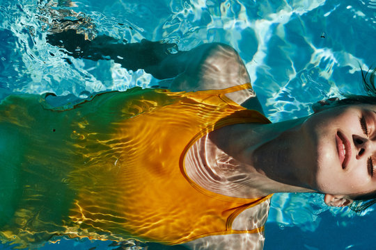 Girl In Swimming Pool