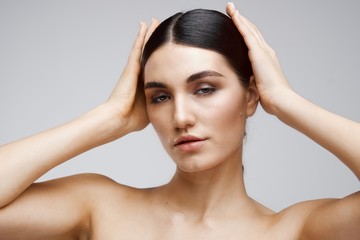 Naklejka premium beautiful woman bare shoulders clean skin