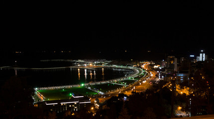 Fototapeta na wymiar A walk through the night Baku. View of the city from a height. Azerbaijan