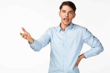young man pointing at something
