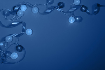 Classic Blue color of the Year 2020.Gradient.Holiday congratulatory background with cotton balls. Copy space.