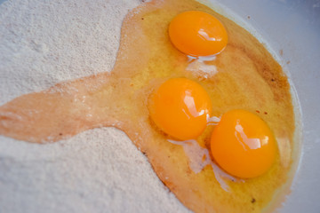 Ingredients for baking: flour, eggs, buttermilk, sugar
