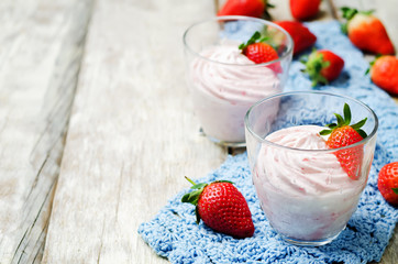 strawberry mousse on a dark wooden background