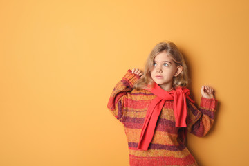 Cute fashionable girl on color background