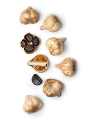Black garlic on white background