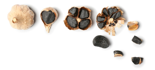 Black garlic on white background