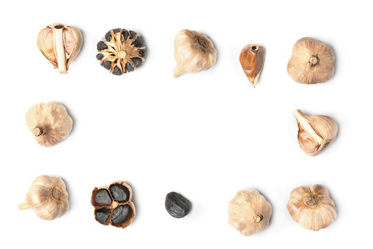Frame made of black garlic on white background