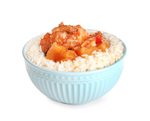 Bowl with tasty rice, chicken and vegetables on white background