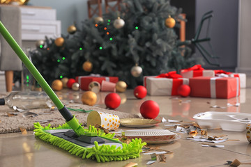 Cleaning of floor in room after New Year party