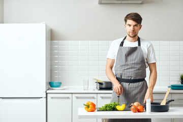 man cooking in the kitchen