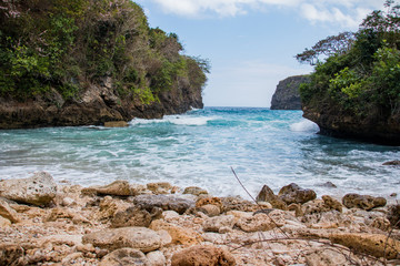 Secret Rocky Beach With Bright Turquoise Water Hidden In A Valley Named Bulian Beach In Nusa...