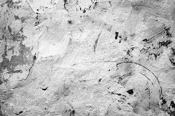 Texture of a concrete wall with cracks and scratches which can be used as a background