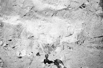 Texture of a concrete wall with cracks and scratches which can be used as a background