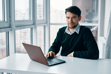 Fototapeta premium businessman working on laptop in office
