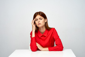 portrait of young woman sitting on the floor