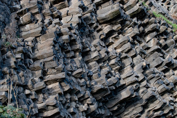 Nature background. Soft focus of geological structure, geological structure, basalt columns